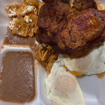 Indio's Taco House - Pork chops with chilaquiles and over easy eggs - Mexican Near Me - Houston, Texas Indio's Taco House - Pork chops with chilaquiles and over easy eggs - Mexican Near Me - Houston, Texas