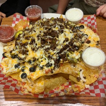 Mic Mac Bar & Grill - Large nachos with beef. Recommended for big groups. - Bars Near Me - Dartmouth, Nova Scotia Mic Mac Bar & Grill - Large nachos with beef. Recommended for big groups. - Bars Near Me - Dartmouth, Nova Scotia