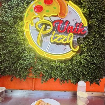 Unik Pizza - Pizza acquired - Pizza Near Me - New York, New York