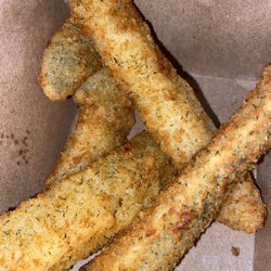 Vihaan's Pizzeria - Deep fried pickles (half eaten)