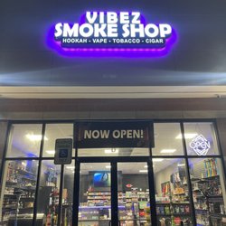 Vibez Smoke Shop - Picture of the store front during the night time. Easy to spot from the road.