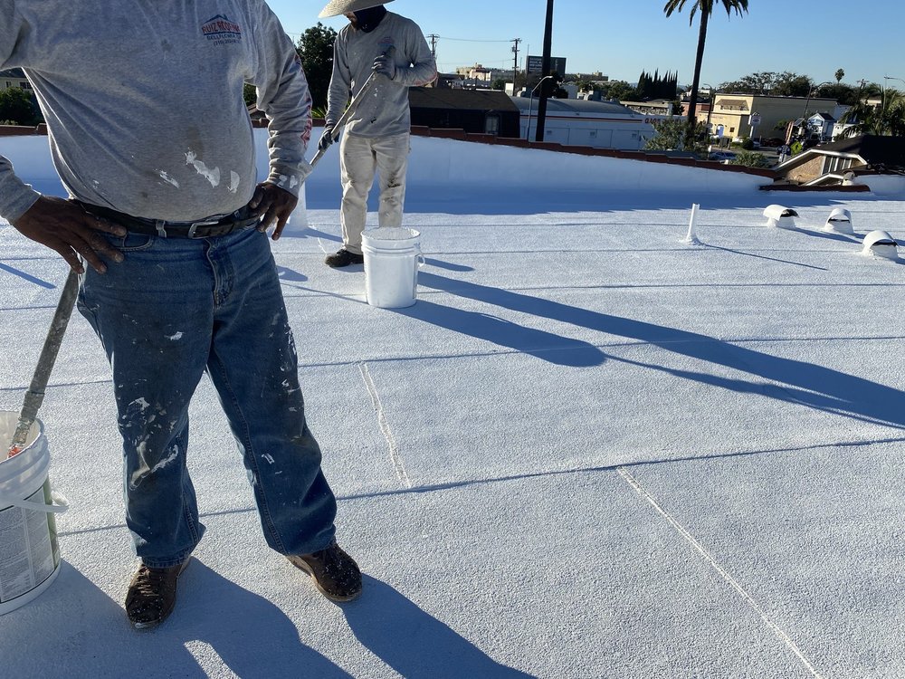 Slide of Ruiz Roofing Construction