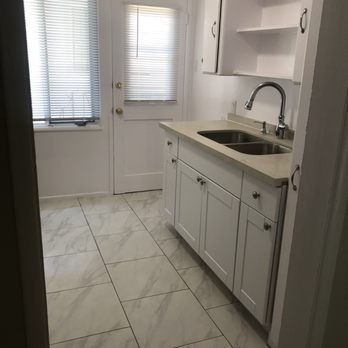 Essential Management - Kitchen after, new floor, counters, sink, paint etc - Property Management Near Me - Los Angeles, California Essential Management - Kitchen after, new floor, counters, sink, paint etc - Property Management Near Me - Los Angeles, California