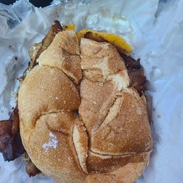Bacon, egg, and cheese on a roll.