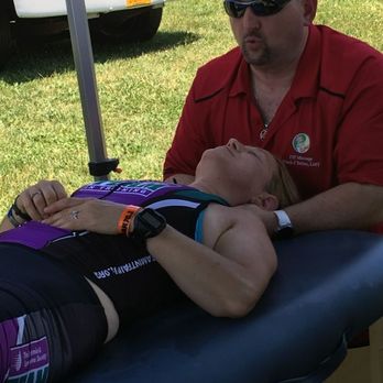 Reviving Hands Massage - Getting triathlons ready at the Jamesville Ironman Event, in Jamesville, NY - Massage Therapy Near Me - Camillus, New York Reviving Hands Massage - Getting triathlons ready at the Jamesville Ironman Event, in Jamesville, NY - Massage Therapy Near Me - Camillus, New York