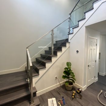 VB Luxury Floors - a staircase in a new home - Flooring Near Me