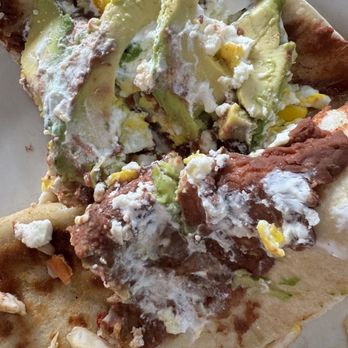 Casamigo Bar & Grill - 1 Baleada (flour tortilla filled w refried beans, Honduran cream, sliced avocado & hard boiled egg, crumbled farmer cheese - Bars Near Me - Washington, DC, District of Columbia
