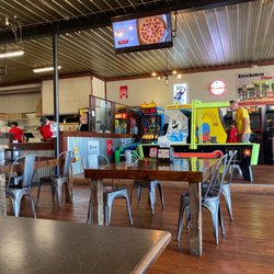 Pizza King Brookston - Playing games while we wait for our food.