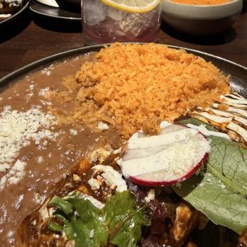 Santoro - Mole Enchiladas with rice and beans - Mexican Near Me - Omaha, Nebraska Santoro - Mole Enchiladas with rice and beans - Mexican Near Me - Omaha, Nebraska