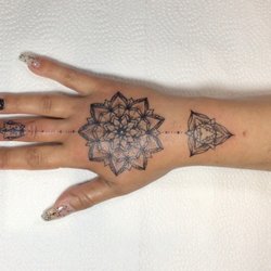 Armada Tattoo Company - Some mandala action tattooed by Derek