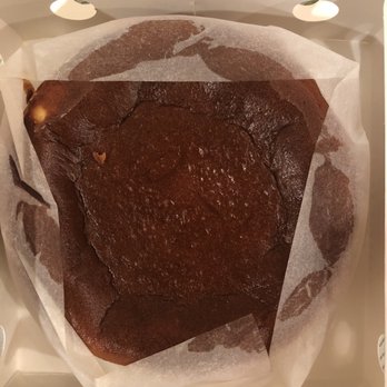 Uncle Tetsu - Dark top of basque cheese cake in box - Bakeries Near Me - San Francisco, California Uncle Tetsu - Dark top of basque cheese cake in box - Bakeries Near Me - San Francisco, California
