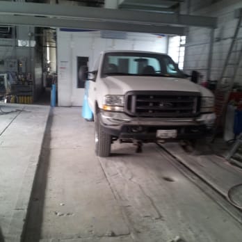 Erie Collision Center - We can fit any size vehicle on our Concept spray and bake booth - Body Shops Near Me - Chicago, Illinois