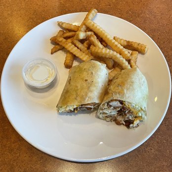 Moran's Grill - Crispy chicken wrap and fries with a side of sour cream. - American Near Me - Bellevue, Nebraska Moran's Grill - Crispy chicken wrap and fries with a side of sour cream. - American Near Me - Bellevue, Nebraska