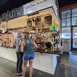 Tyde Tate Kitchen - CFW - TydeTate Kitchen storefront counter inside the Chattahoochee Food Works at The Works. Free street, surface, deck parking on-site.