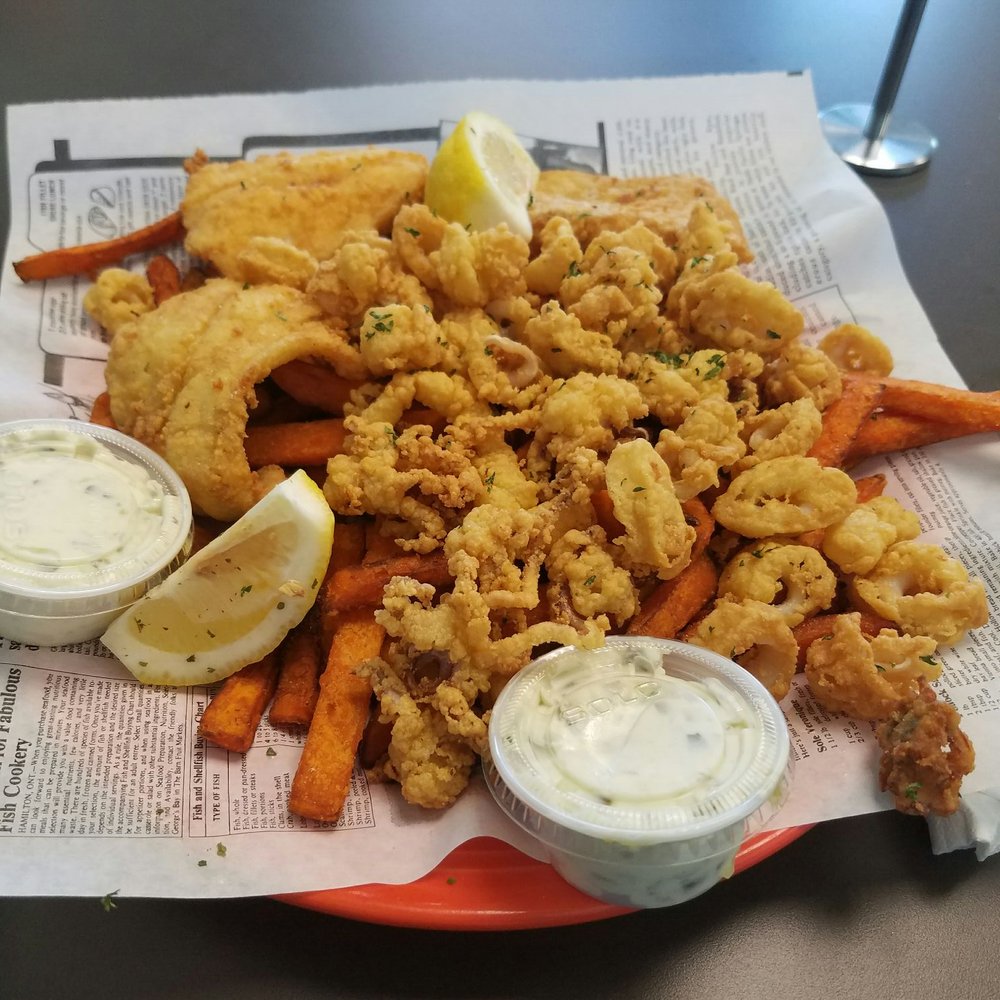 Nick's Place - Haddock and fried calamari dinner. With two sides. Sweet potato fries and Mac and cheese. - Pizza Near Me - Salisbury, Massachusetts Nick's Place - Haddock and fried calamari dinner. With two sides. Sweet potato fries and Mac and cheese. - Pizza Near Me - Salisbury, Massachusetts