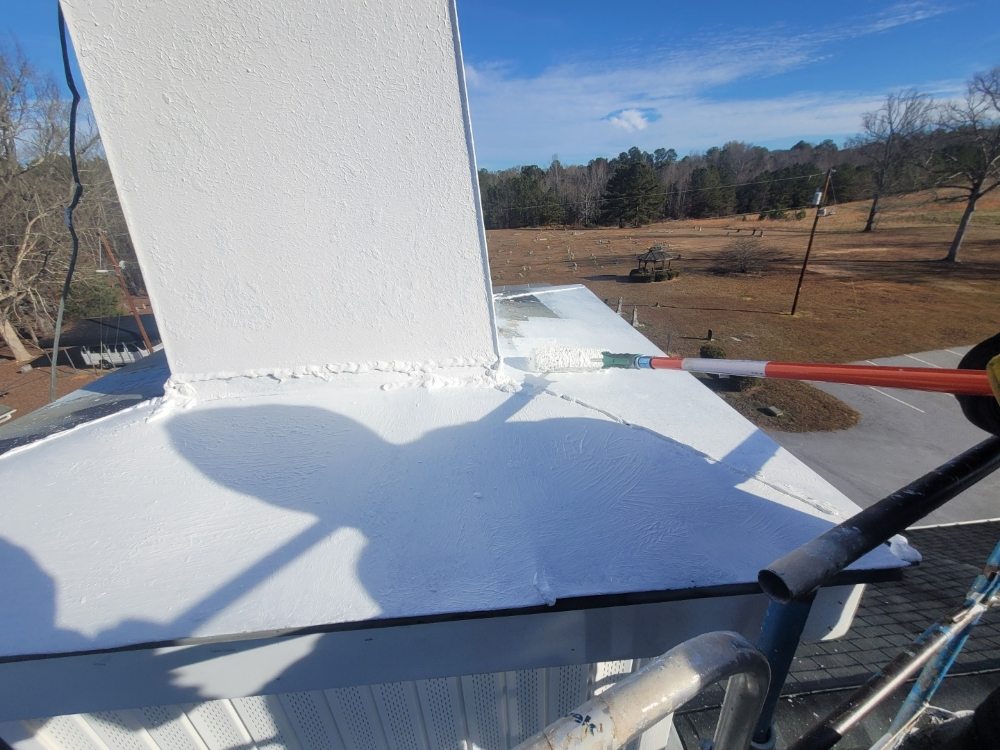 Slide of E. Thompson Roofing