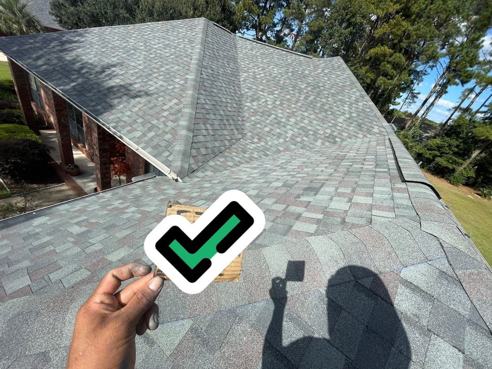 Slide of H.E. Roberts Roofing