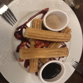 Santa Fe - Freshly fried Churros with cinnamon sugar and chocolate sauce. - Latin American Near Me - New Orleans, Louisiana Santa Fe - Freshly fried Churros with cinnamon sugar and chocolate sauce. - Latin American Near Me - New Orleans, Louisiana