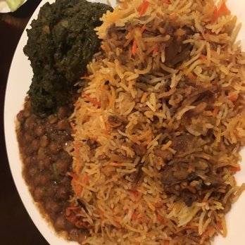 Aman - a plate of rice, beans and spinach - Pakistani Near Me - Bronx, New York Aman - a plate of rice, beans and spinach - Pakistani Near Me - Bronx, New York
