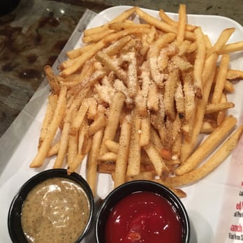 Proudest Monkey - Large Idaho yuppy fries with ketchup and monkey sauce. So good - Burgers Near Me - Bryan, Texas
