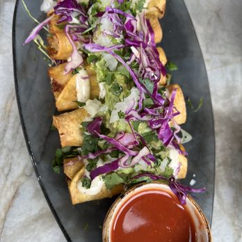 Caló Kitchen + Tequila - Potato taquitos - Cocktail Bars Near Me - Costa Mesa, California Caló Kitchen + Tequila - Potato taquitos - Cocktail Bars Near Me - Costa Mesa, California