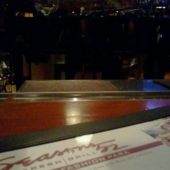Seasons 52 - CC Jones at the piano - New American Near Me - Phoenix, Arizona Seasons 52 - CC Jones at the piano - New American Near Me - Phoenix, Arizona