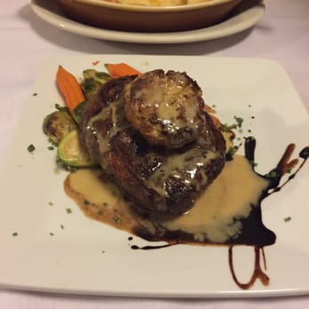 Mill Pond Steakhouse - Filet Mignon with Crab Cake on Top, Brussel Sprouts, and Carrots. - Steakhouses Near Me - Rembert, South Carolina Mill Pond Steakhouse - Filet Mignon with Crab Cake on Top, Brussel Sprouts, and Carrots. - Steakhouses Near Me - Rembert, South Carolina