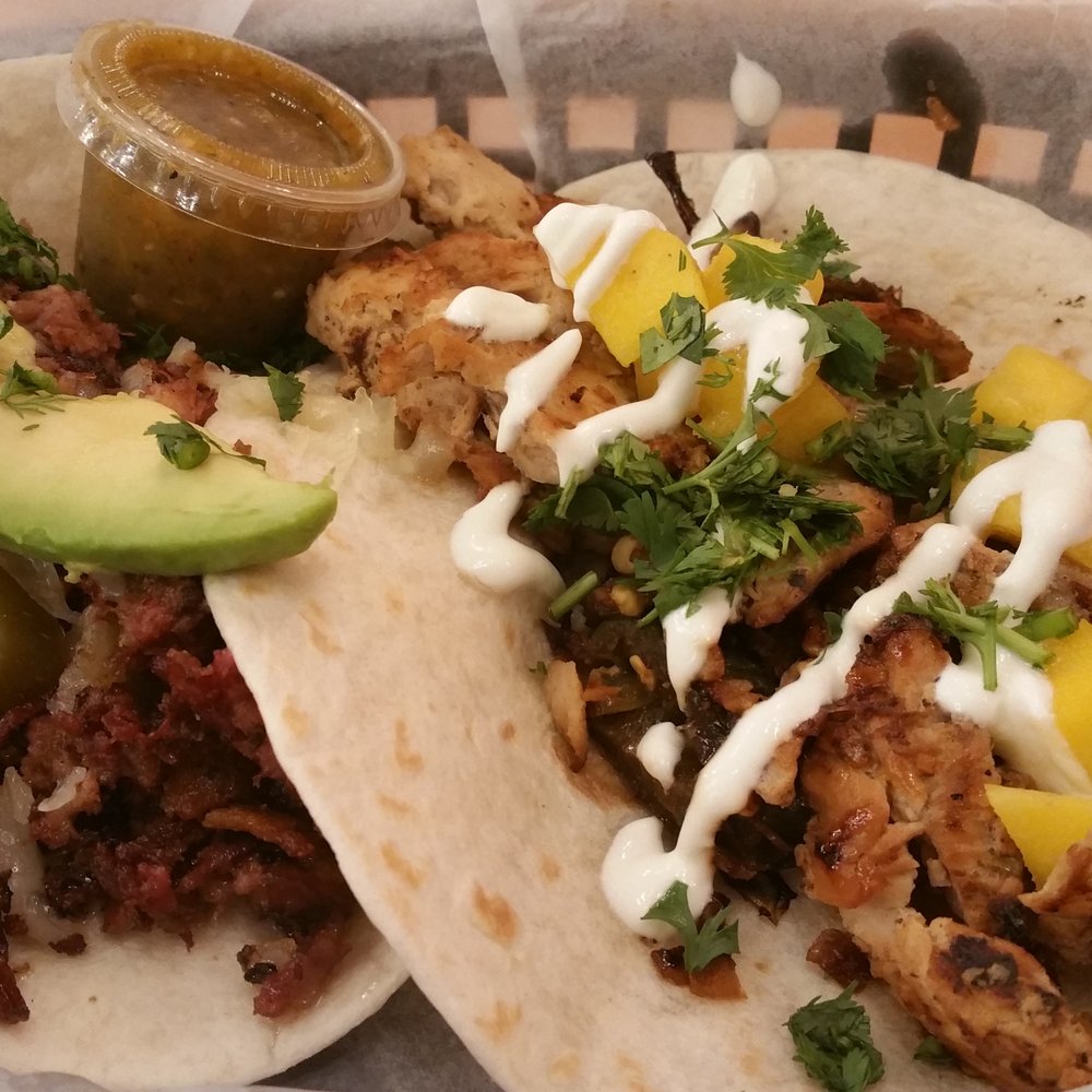 Torchy's Tacos - Beef Brisket on the left, Jamaican Jerk Chicken on the right. Damn good! - Tex-Mex Near Me - Denver, Colorado Torchy's Tacos - Beef Brisket on the left, Jamaican Jerk Chicken on the right. Damn good! - Tex-Mex Near Me - Denver, Colorado