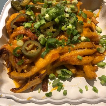Rodeo Goat - Cheese fries w/queso, jalapeños, and green onions - Burgers Near Me - Dallas, Texas Rodeo Goat - Cheese fries w/queso, jalapeños, and green onions - Burgers Near Me - Dallas, Texas