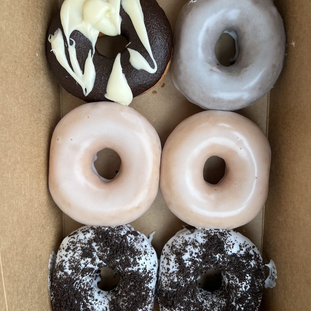 a variety of donuts in a box a variety of donuts in a box