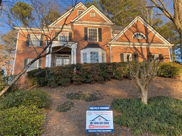 Slide of Veteran's Roofing Company