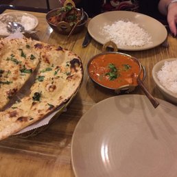 Garlic naan, chicken tikka masala and mango chicken