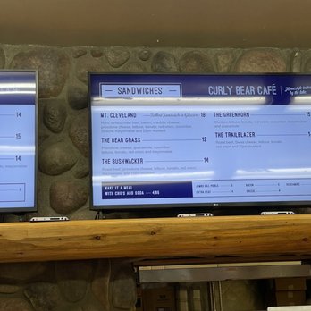Curly Bear Café - menus on two televisions - Food Near Me - Saint Mary, Montana