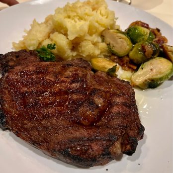Lemon Grass - Rib eye steak with mashed potatoes and brussel sprouts - Thai Near Me - Syracuse, New York Lemon Grass - Rib eye steak with mashed potatoes and brussel sprouts - Thai Near Me - Syracuse, New York