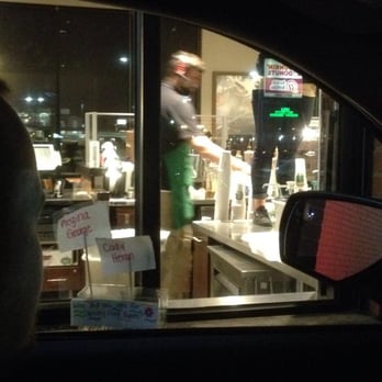 Starbucks - Just want I want to see! An employee in plain clothes standing on top of the counters where my drinks are being made! LOL - Coffee & Tea Near Me - Woodhaven, Michigan