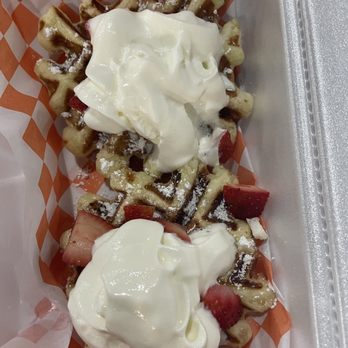 Suthern Cluck Chicken and Waffle - Waffles - a cross between a Belgian waffle and a funnel cake - perfection - Soul Food Near Me - Buford, Georgia Suthern Cluck Chicken and Waffle - Waffles - a cross between a Belgian waffle and a funnel cake - perfection - Soul Food Near Me - Buford, Georgia