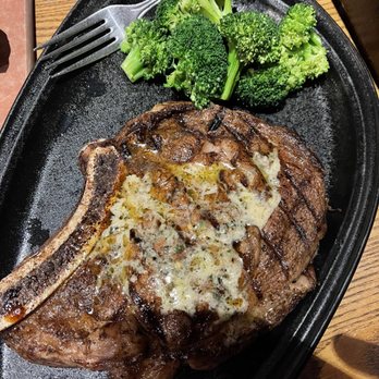 Outback Steakhouse - $28.49 | 18oz Bone-in Ribeye (1350 cal.) topped w/ roasted garlic butter (150 cal.) + $1.99. Side of steamed broccoli - Steakhouses Near Me - Bel Air, Maryland Outback Steakhouse - $28.49 | 18oz Bone-in Ribeye (1350 cal.) topped w/ roasted garlic butter (150 cal.) + $1.99. Side of steamed broccoli - Steakhouses Near Me - Bel Air, Maryland