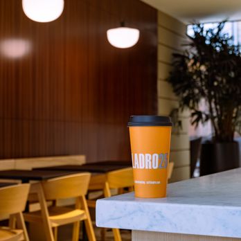 Caffe Ladro - Downtown 2+U - a coffee cup on a counter - Coffee & Tea Near Me - Seattle, Washington Caffe Ladro - Downtown 2+U - a coffee cup on a counter - Coffee & Tea Near Me - Seattle, Washington