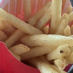 Not the burnt part,Look closely at brown and black specs all over the fries.I was scared to eat them. Not the burnt part,Look closely at brown and black specs all over the fries.I was scared to eat them.