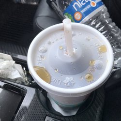 McDonald's - This how the soda was handed to me in the drive thru, completely the wrong order as well and no it was not busy???!?
