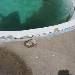 Happy Pools and Spa - Chunks coming off the edges of the pool