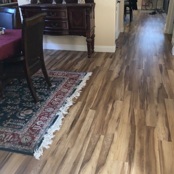 Carpets Plus - a hardwood floor in a living room - Carpeting Near Me - Rancho Cordova, California Carpets Plus - a hardwood floor in a living room - Carpeting Near Me - Rancho Cordova, California