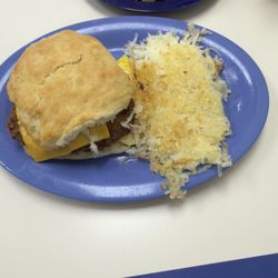 Steak egg and cheese biscuit with hashbrowns