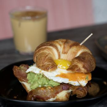 Stemma Craft Coffee - a croissant sandwich on a plate - Coffee Roasteries Near Me - Orlando, Florida