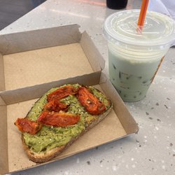 Dunkin' - Roasted tomatoes on Avocado toast and small iced Matcha latte.