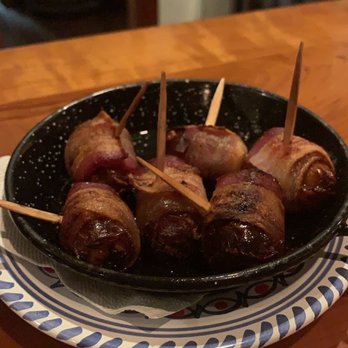 La Tienda Tapas Bar - Bacon-wrapped dates stuff with manchego cheese. - Spanish Near Me - Williamsburg, Virginia La Tienda Tapas Bar - Bacon-wrapped dates stuff with manchego cheese. - Spanish Near Me - Williamsburg, Virginia