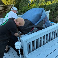 Recycling Relief Junk Cleanup & More - Going down the first flight of stairs.  Two guys on the top and two on the bottom