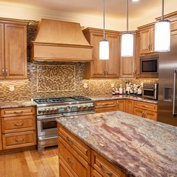 Tile Center - Traditional kitchen style with free standing hood and free standing island design and installed by Tile center. design and installed by Tile