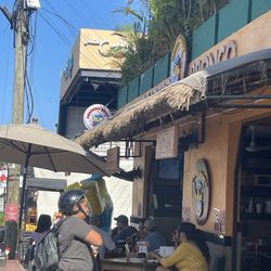Pollos Asados Arguello - Outdoor seating area