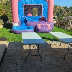 Manny's Party Rentals - Tables & bouncer from Manny's